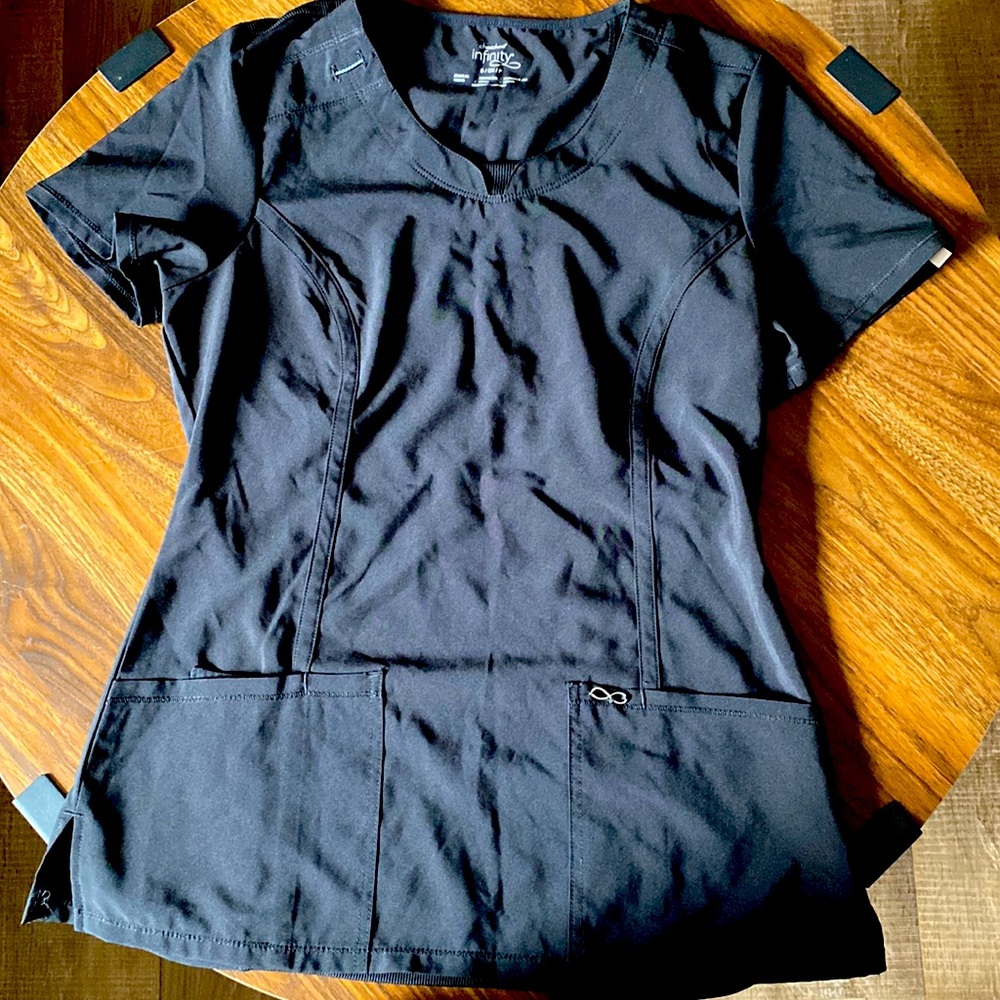 New without tags. Never worn. Scrub top. Cherokee infinity size small